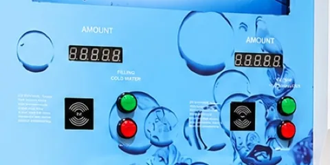 Close-up of amount displays, contactless readers and dispense buttons